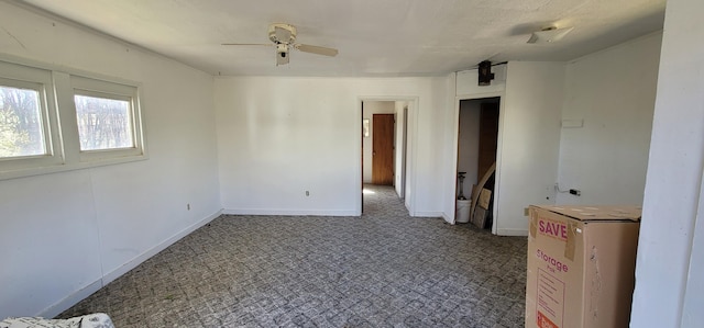 spare room featuring ceiling fan