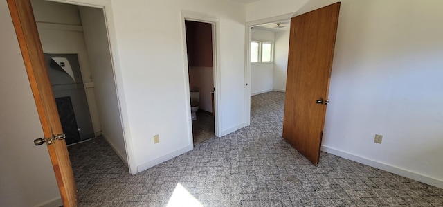 bedroom with carpet and a closet