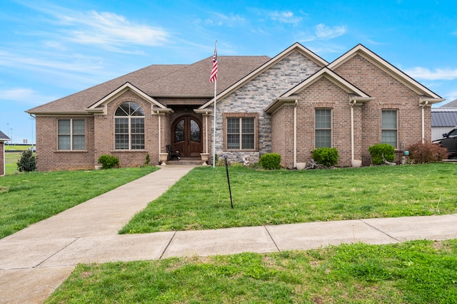 single story home with a front lawn