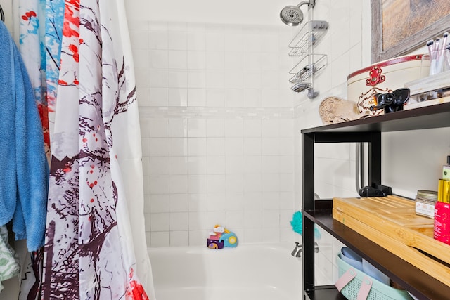 bathroom featuring shower / bathtub combination with curtain