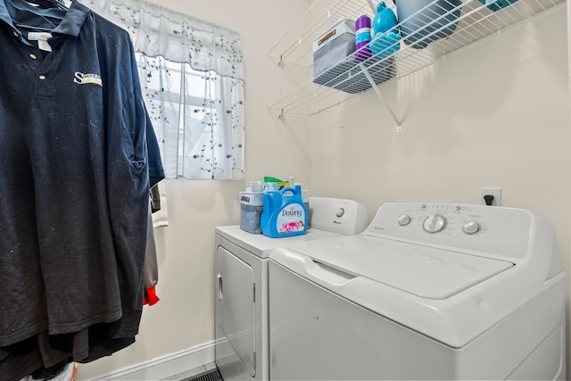 laundry area featuring separate washer and dryer