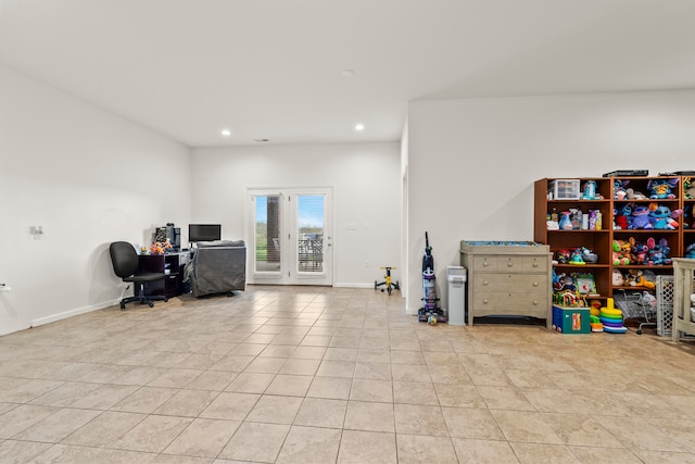 sitting room featuring light tile floors