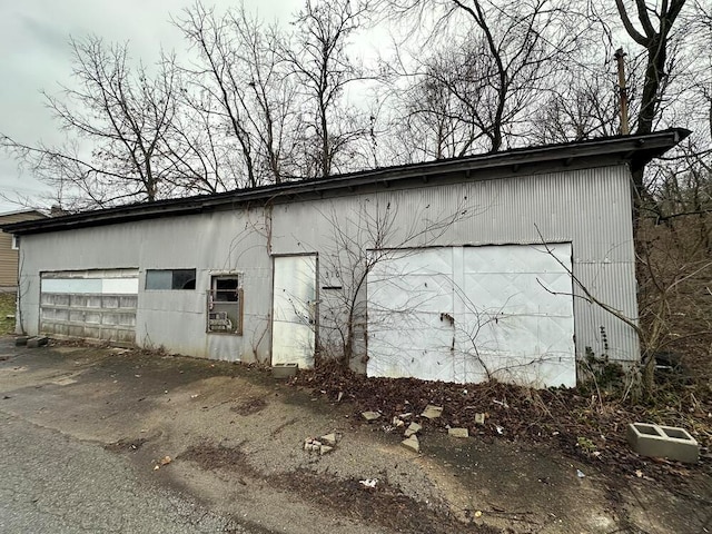 view of side of property featuring a garage