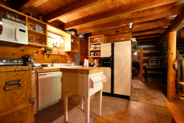 kitchen featuring light hardwood / wood-style floors, beam ceiling, white appliances, and wooden ceiling