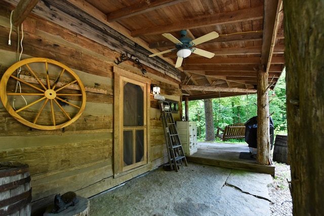 exterior space with ceiling fan