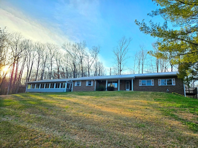 exterior space featuring a lawn