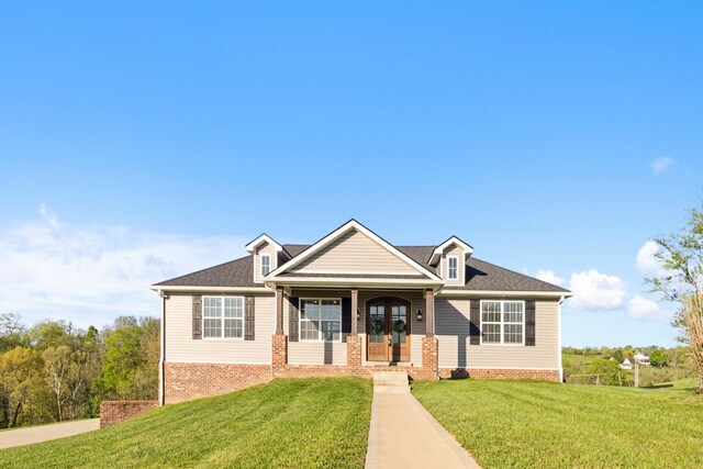 view of front of home featuring a front lawn and a porch