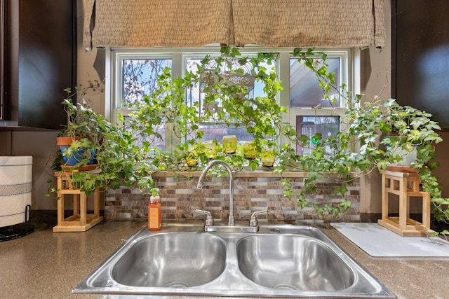 kitchen with sink and backsplash