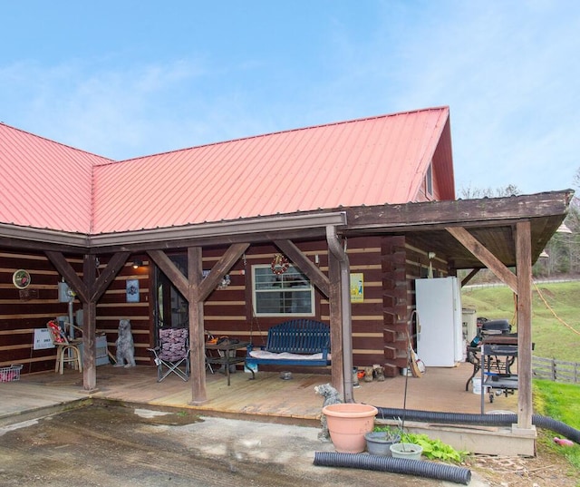 view of property's community featuring a wooden deck