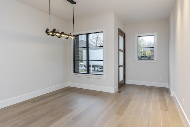 2420 Flying Ebony Dr, Lexington, KY 40509 - interior space with baseboards, a chandelier, and light wood-type flooring