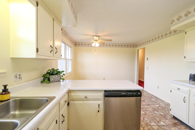 kitchen with a sink, a peninsula, light countertops, and dishwasher