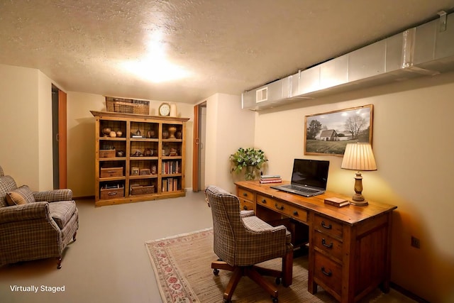 office space featuring a textured ceiling and visible vents