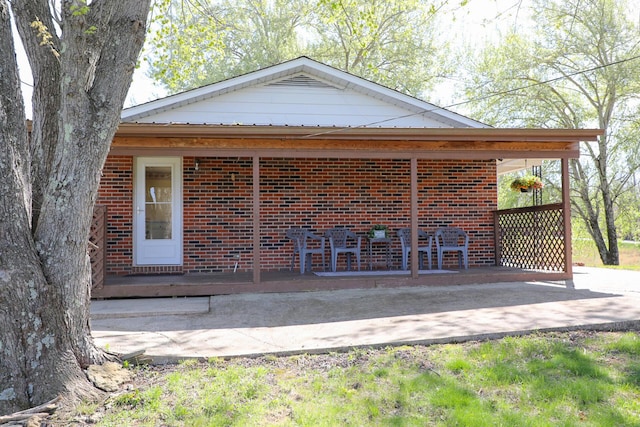 view of home's exterior featuring brick siding