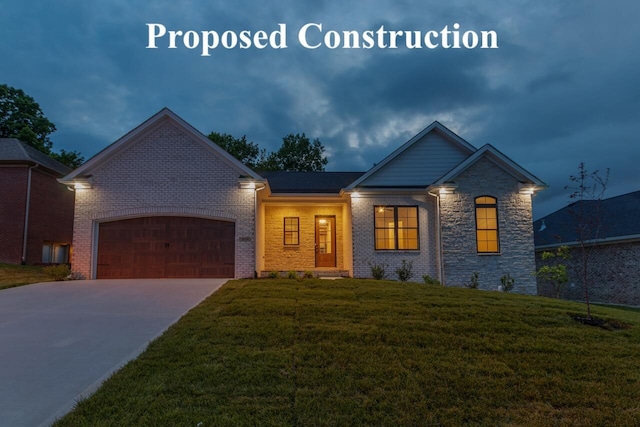 view of front facade featuring a garage and a front lawn