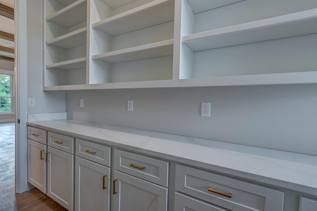 interior details with hardwood / wood-style flooring