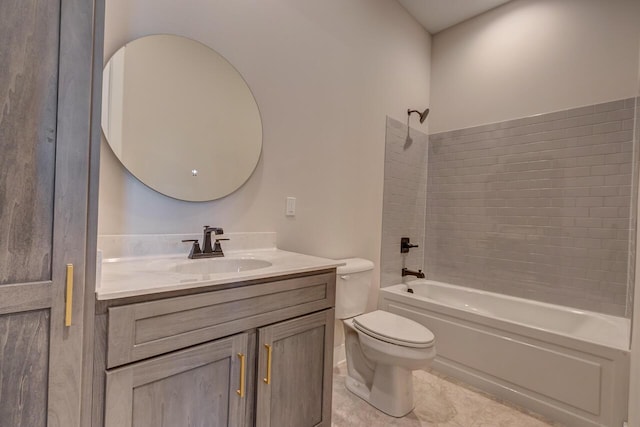 full bathroom with toilet, tile patterned flooring, tiled shower / bath, and vanity