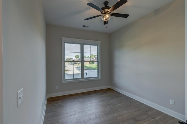 spare room with ceiling fan and hardwood / wood-style floors