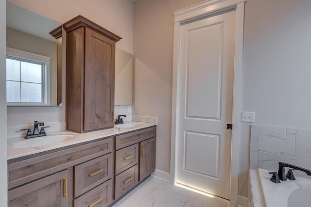 bathroom featuring vanity and a bathtub