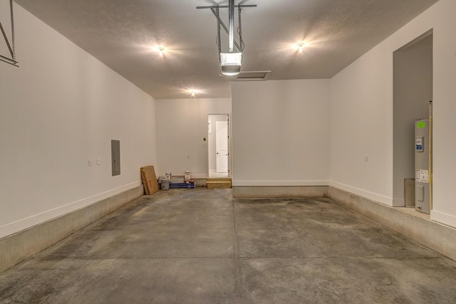 garage with electric water heater, a garage door opener, and electric panel