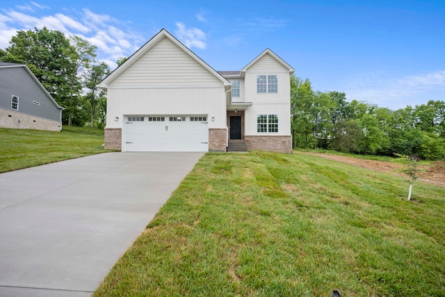 view of front of house featuring a garage and a front lawn