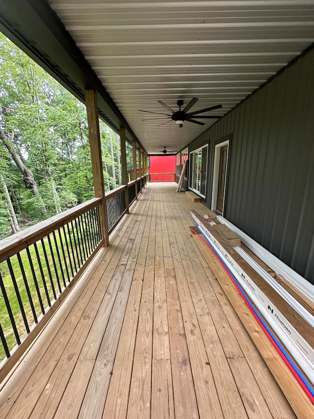 wooden terrace with ceiling fan