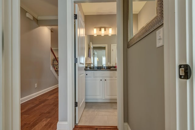 bathroom with vanity and hardwood / wood-style flooring