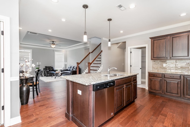 kitchen featuring hanging light fixtures, dishwasher, dark hardwood / wood-style floors, tasteful backsplash, and sink