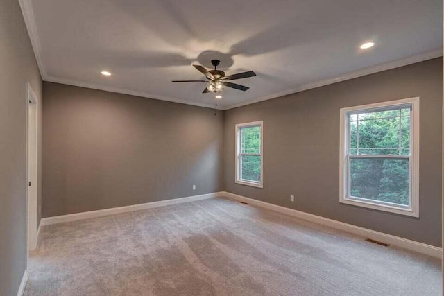 313 Old Station Rd, Frankfort, KY 40601 - unfurnished room with crown molding, light carpet, baseboards, visible vents, and ceiling fan