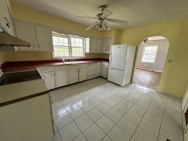 256 Carrick Pike, Georgetown, KY 40324 - kitchen with white appliances, ceiling fan, light tile patterned floors, arched walkways, and a sink