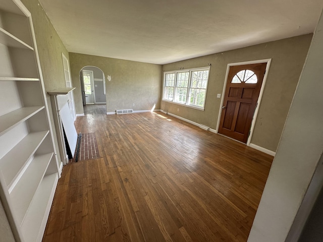 256 Carrick Pike, Georgetown, KY 40324 - foyer featuring arched walkways, hardwood / wood-style flooring, baseboards, and a fireplace