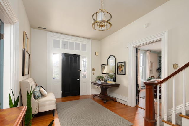 511 Boone Ave, Winchester, KY 40391 - foyer featuring an inviting chandelier and light hardwood / wood-style flooring