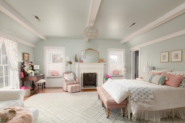 511 Boone Ave, Winchester, KY 40391 - bedroom featuring light hardwood / wood-style floors, vaulted ceiling with beams, and a brick fireplace