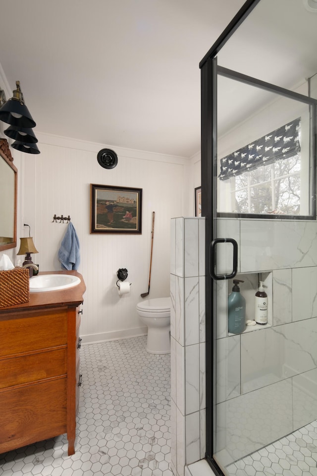 511 Boone Ave, Winchester, KY 40391 - bathroom featuring ornamental molding, toilet, tile flooring, and vanity