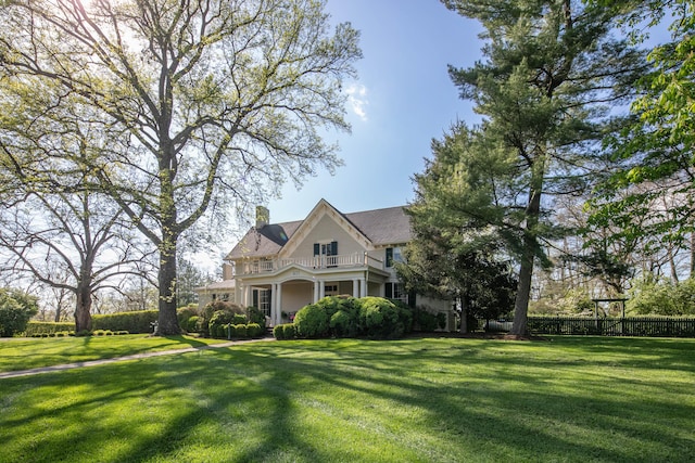 511 Boone Ave, Winchester, KY 40391 - victorian home with a front yard and a balcony