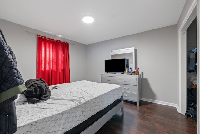 bedroom featuring dark wood-type flooring