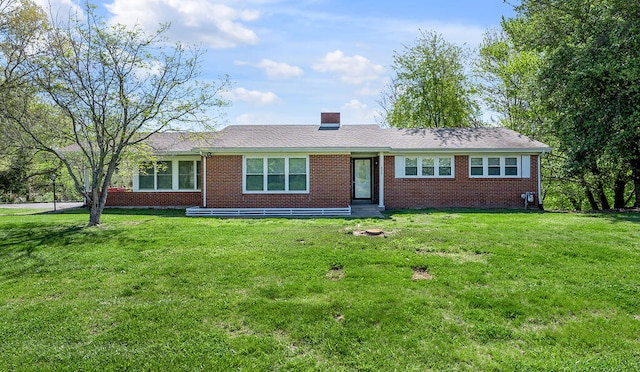 ranch-style house with a front yard