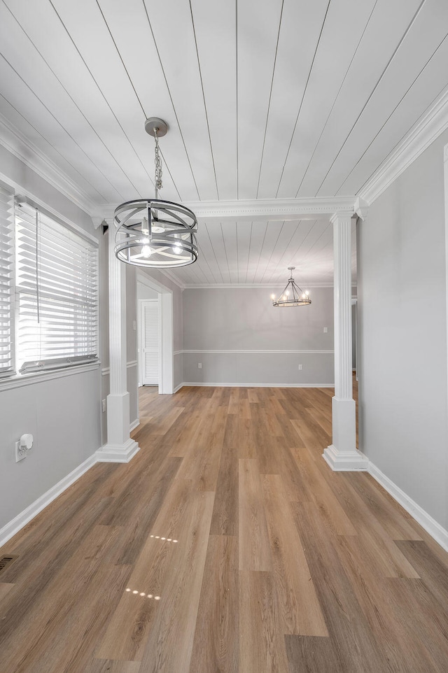 unfurnished room with ornamental molding, wooden ceiling, decorative columns, and hardwood / wood-style floors