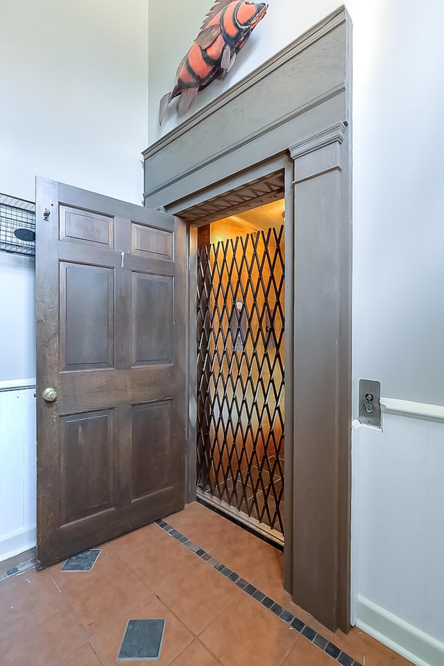 interior details featuring tile floors