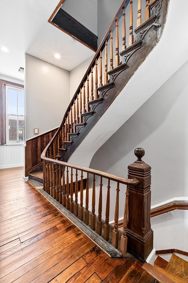 stairway with wood-type flooring