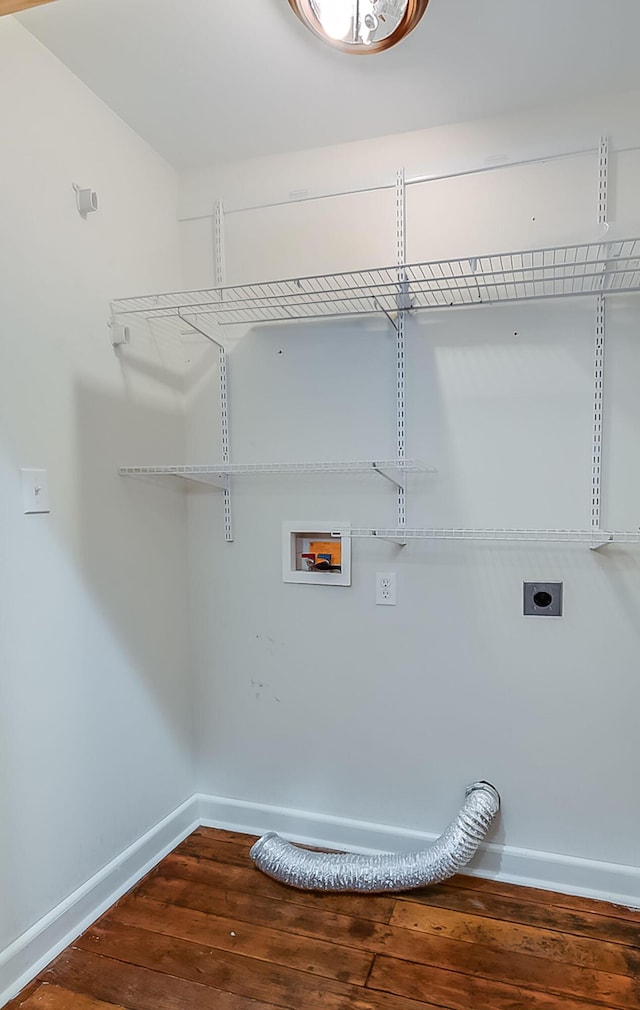 washroom with wood-type flooring, hookup for an electric dryer, and washer hookup