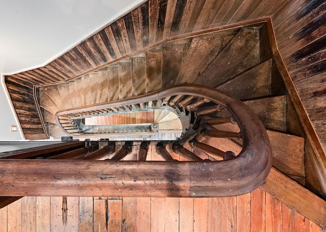 details featuring wooden ceiling and wooden walls