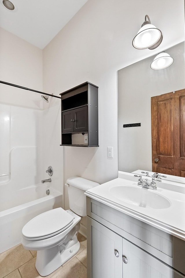 full bathroom with bathtub / shower combination, vanity, toilet, and tile flooring