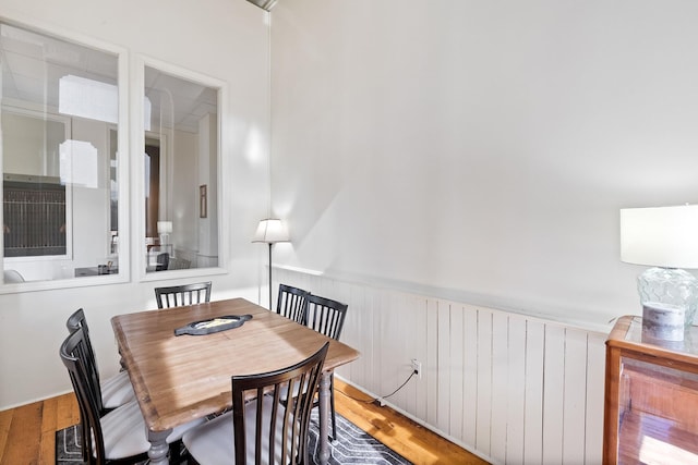 dining area with wood-type flooring