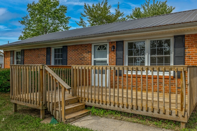 exterior space featuring a wooden deck