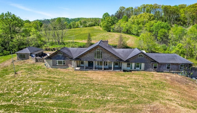 view of front of home with a front lawn