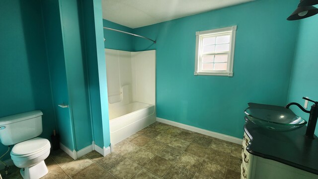 full bathroom with vanity, shower / tub combination, tile floors, and toilet