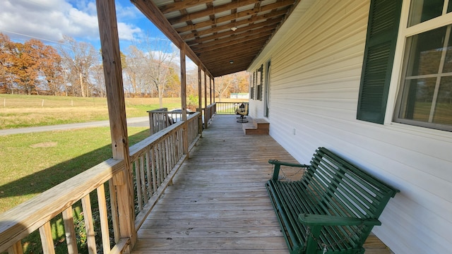 deck featuring a lawn