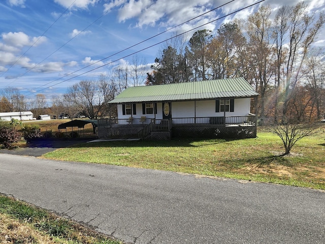 view of front of property with a porch and a front yard