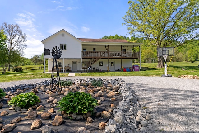 exterior space with a porch and a lawn