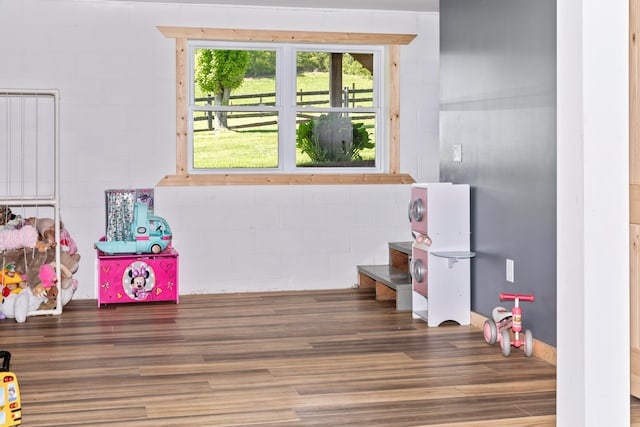 game room featuring dark hardwood / wood-style flooring